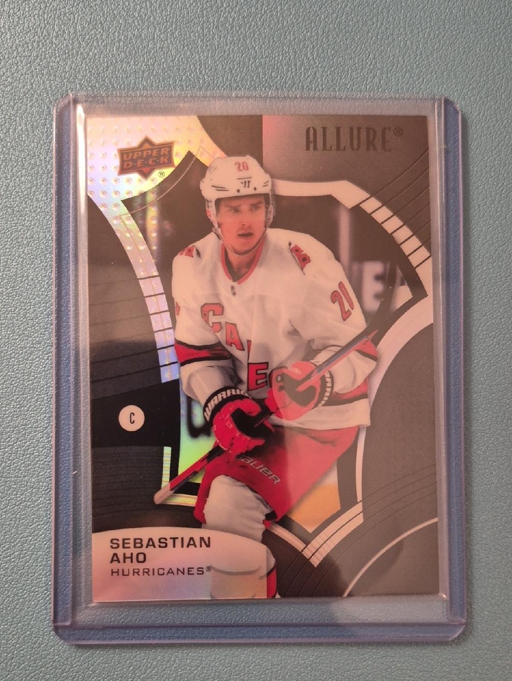 Allure Sebastian Aho Black Rainbow Hockey Card - Pink & Black